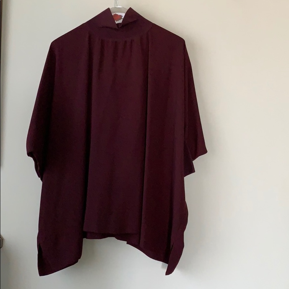 Loose fitting tunic with mock turtleneck
